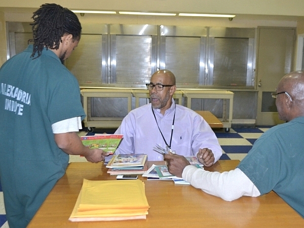 volunteer assisting inmates at jail