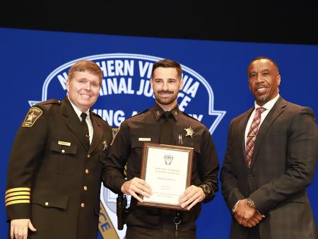 deputy receives award from sheriff and academy director