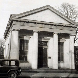 Athenaeum with old car, black-and-white photograph