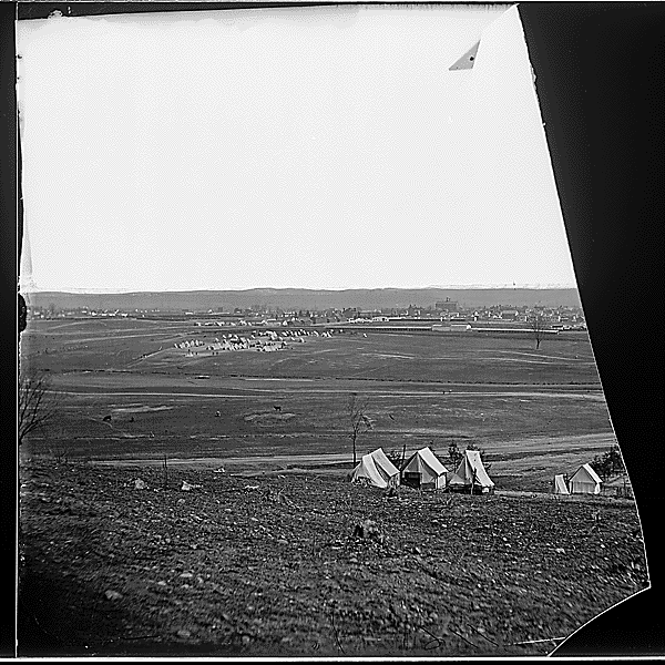 The first Camp Convalescent, near Shuter's Hill. View of Alexandria, Va. from camp of 44th, N.Y. Inf, ca. 1860-1865. Photograph by Matthew Brady. (The emulsion is lifting from the fragile negative in the National Archives.)