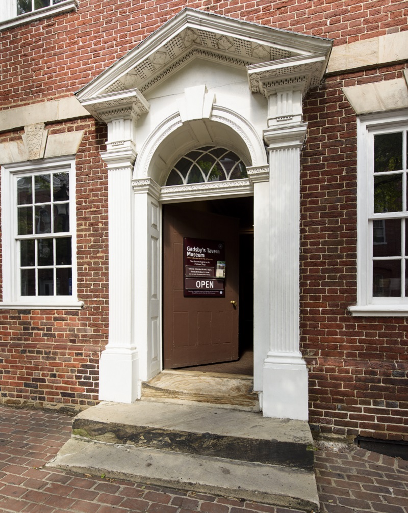 Open door welcoming visitors to Gadsby's Tavern Museum