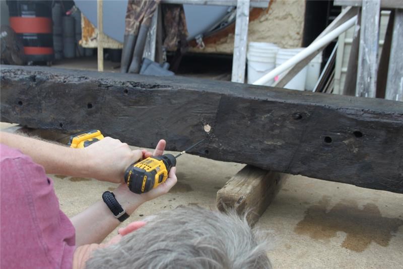 Hotel Indigo Ship Conservation: removing iron fasteners from wood