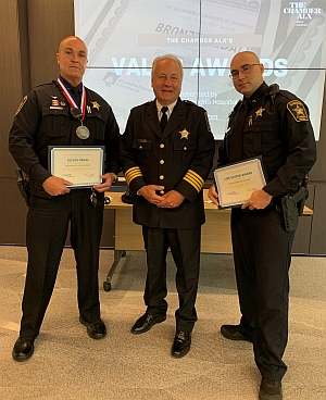 Sheriff and deputies with awards