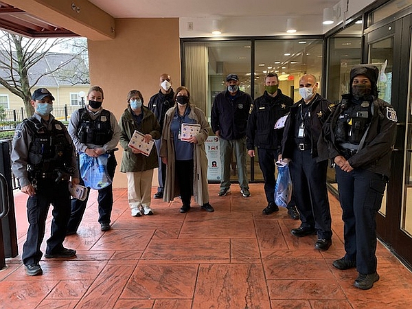 volunteers and City staff with vaccination information