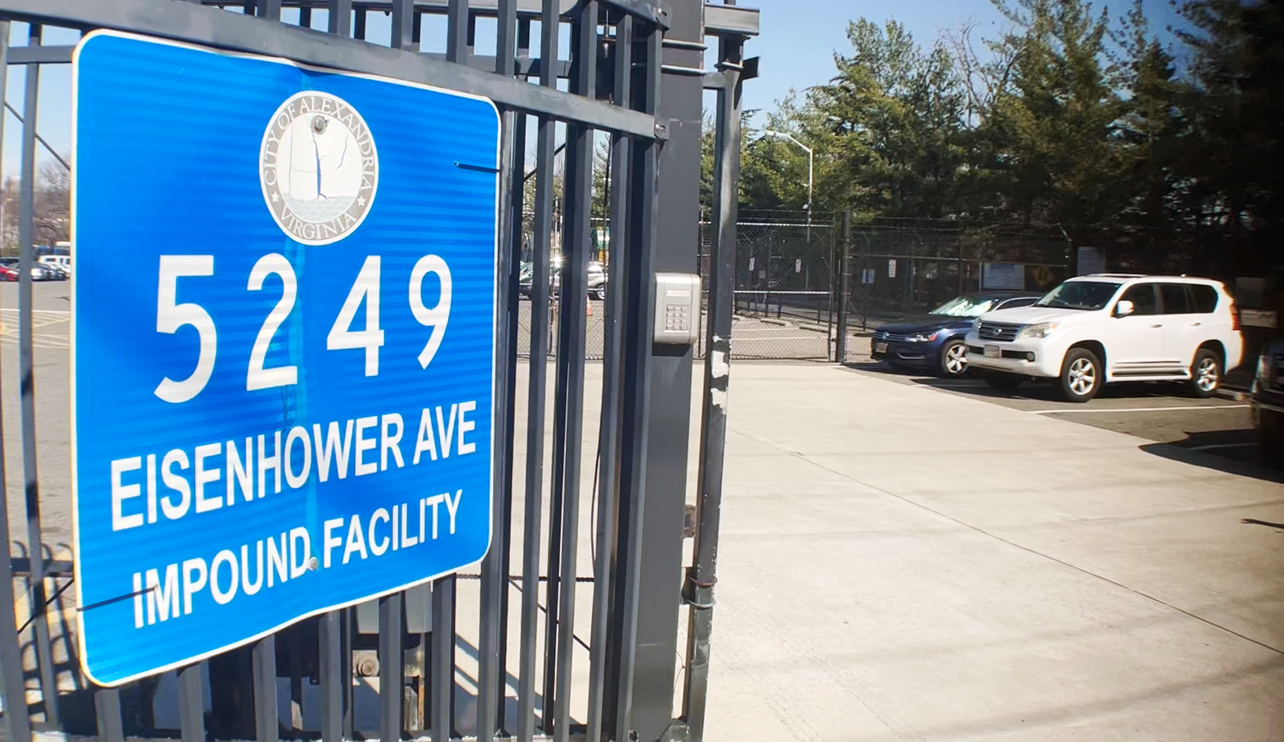 A photo of the front entry gate at the City's Impound lot at 5249 Eisenhower Avenue