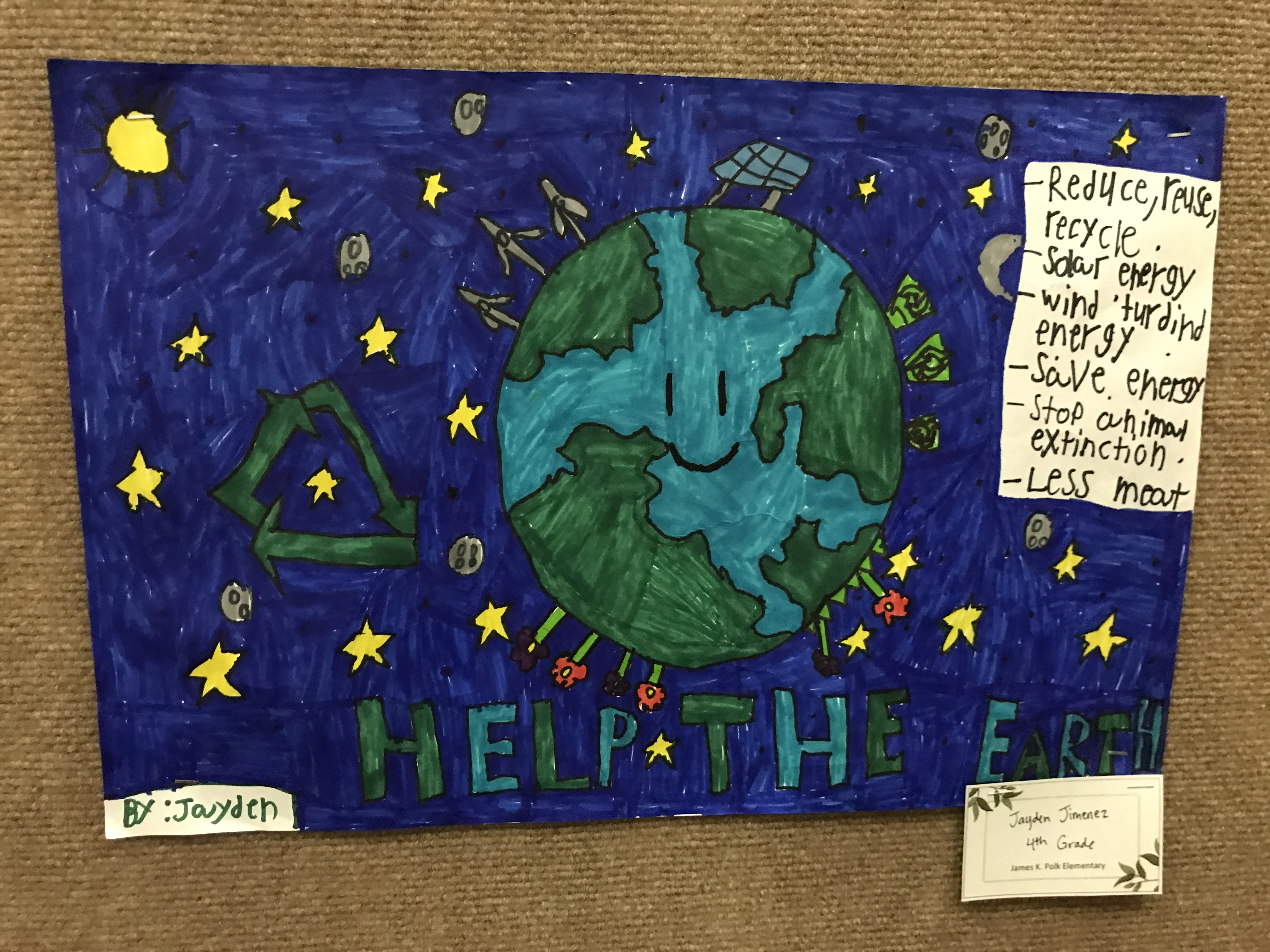 2022 Earth Day student art contest submission (marker drawing of globe against dark blue background)