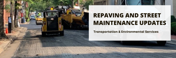 Photo of work vehicles paving an Alexandria street