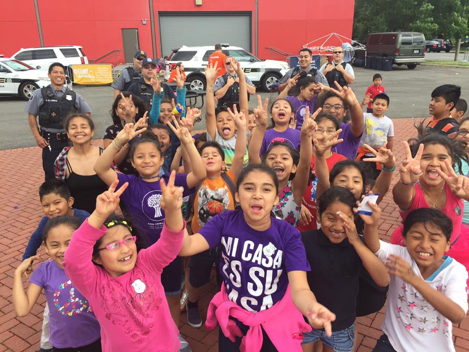 A group of children cheering