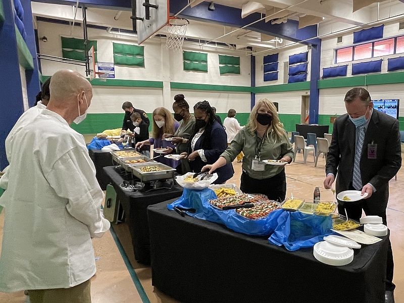 people at a food buffet