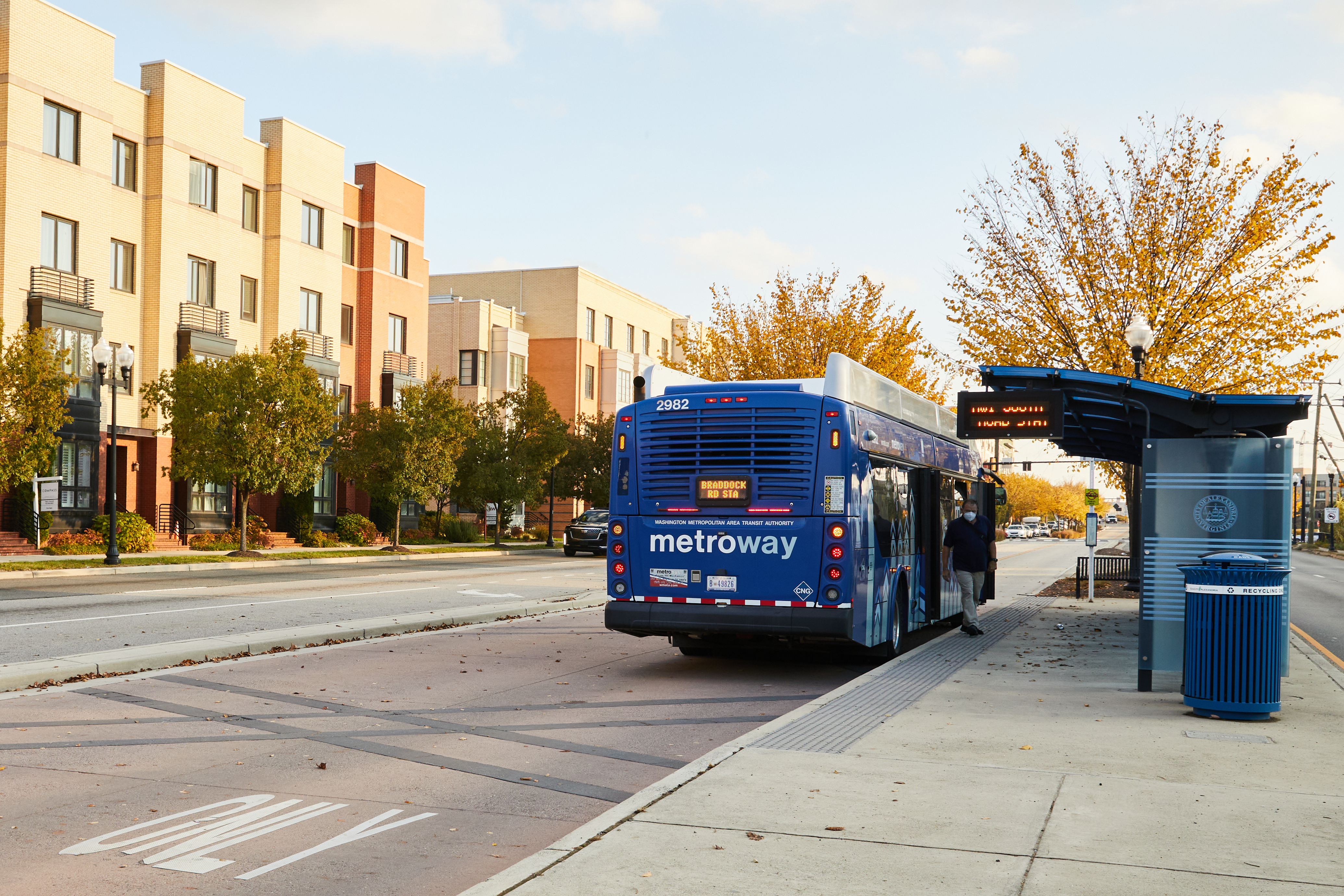 A person boarding the bus