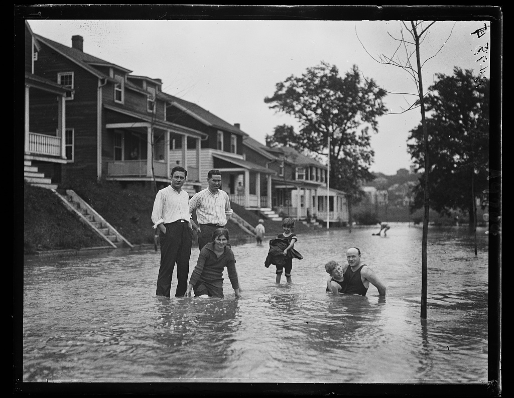 Rosemont residents swimming in the street, 1922
