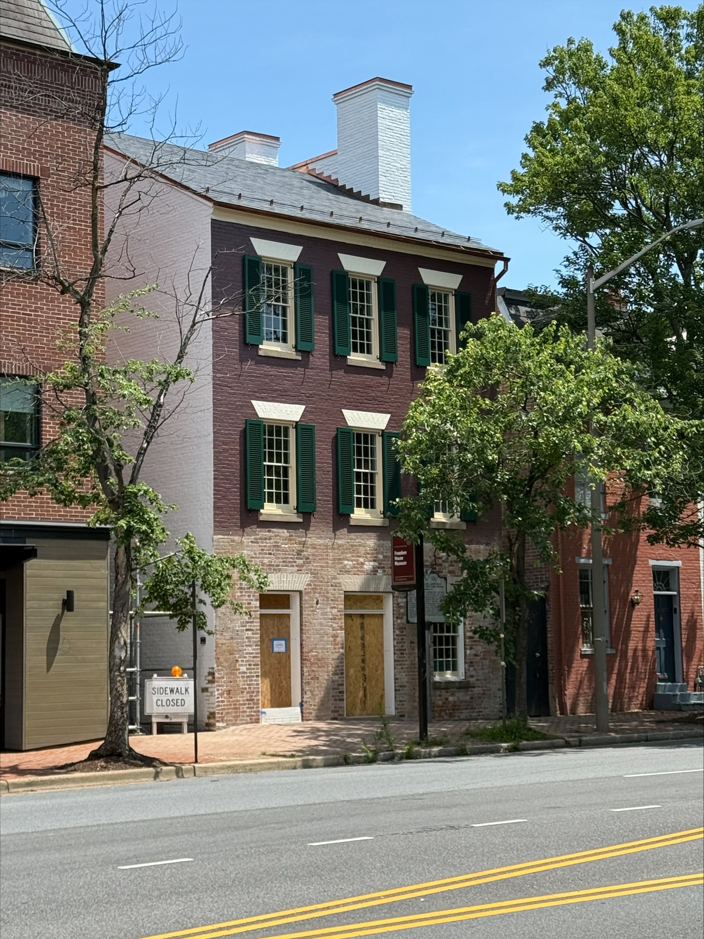 Scaffolding removed on 1315 Duke Street, partially painted
