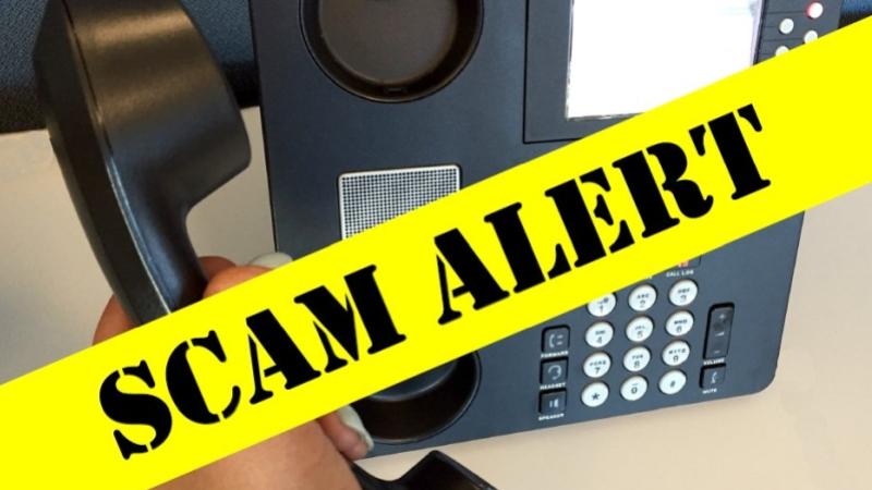 phone with a yellow warning message