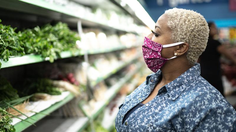 Grocery Shopper with Mask stock image