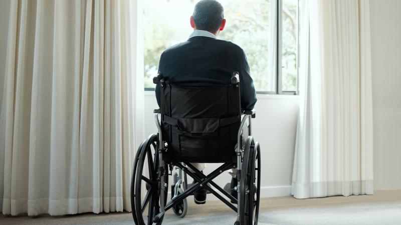 Photo of senior alone n wheelchair
