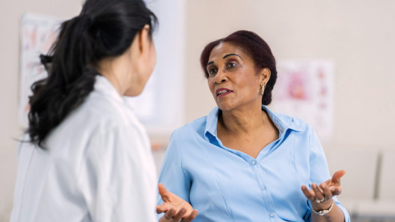 picture of a patient asking a doctor a question