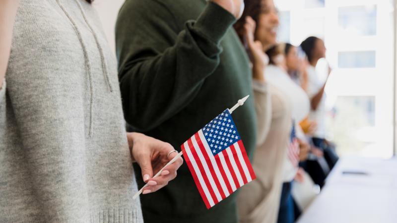 Stock photo of persons taking the oath of allegiance 