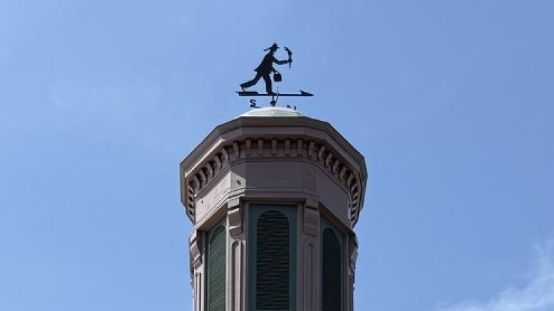The cupola at Friendship Firehouse is topped with a weathervane in the shape of a fireman.