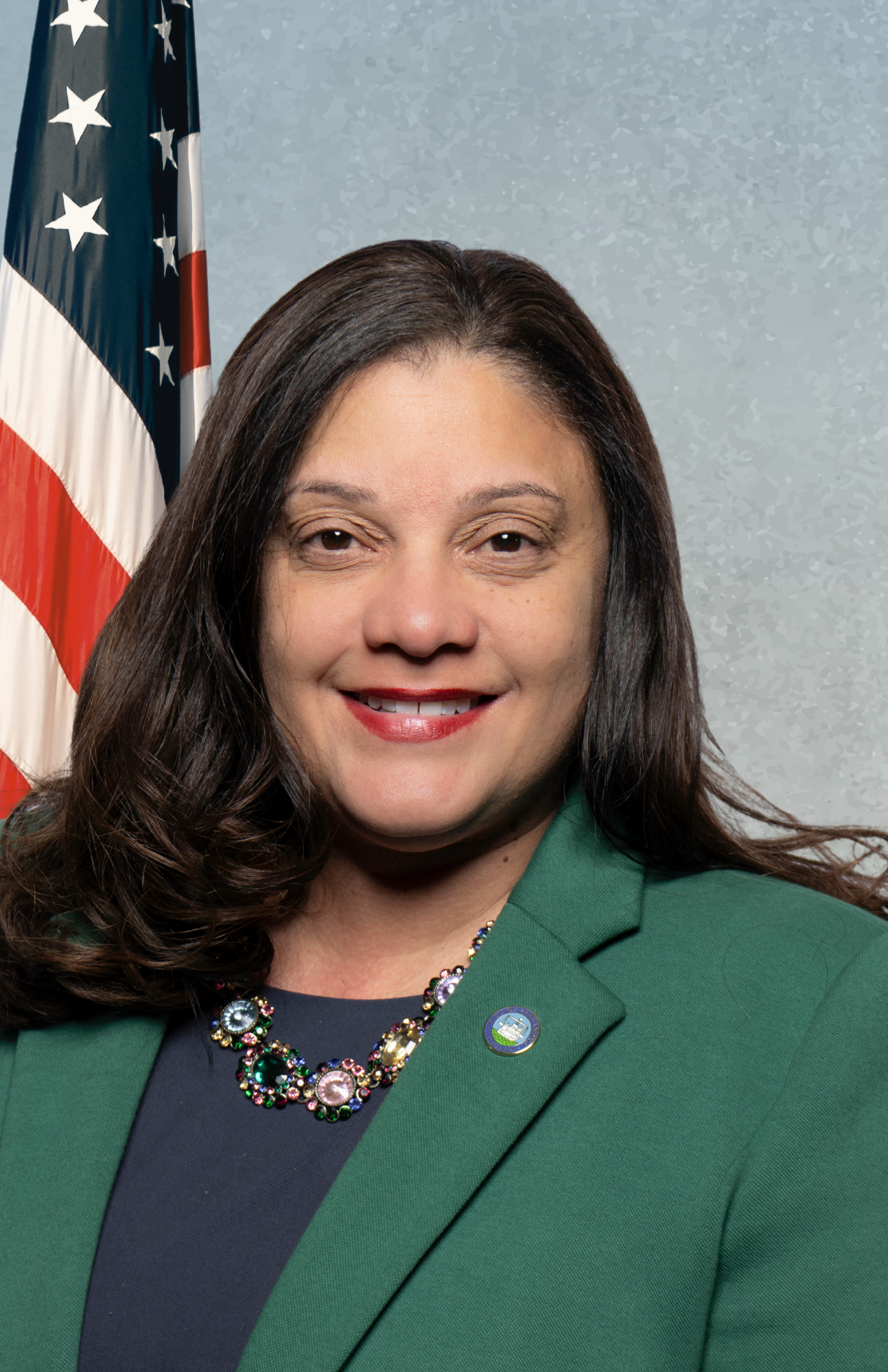 councilwoman greene on blue background with american flag