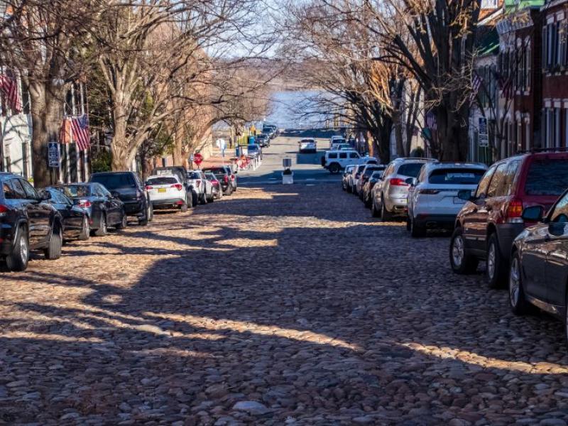 Photo of cars parked on a cobbled street in Old Town