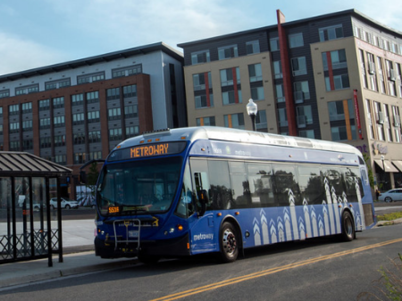 A photo of a Metrobus using the rapid transit lanes on Route 1 near Potomac Yard in Alexandria