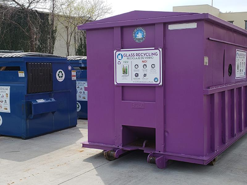 Photo of a purple glass-only recycling bin