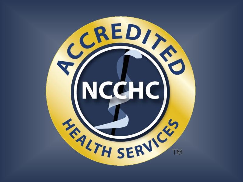 round gold and blue graphic for NCCHC accreditation