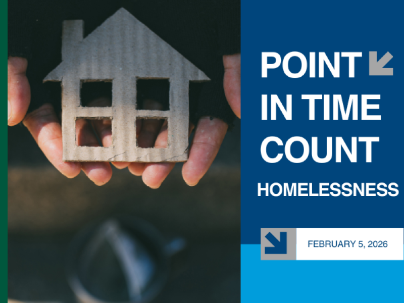 photo of hands holding small cardboard house