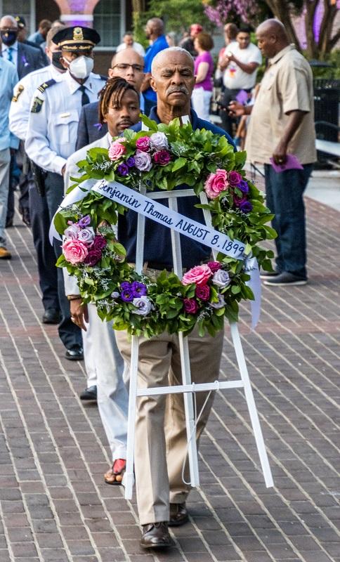 Worshipful Grand Historian McArthur Myers, 31st Masonic District MWPHGLVA, leads the procession for the wreath laying and marker dedication.
