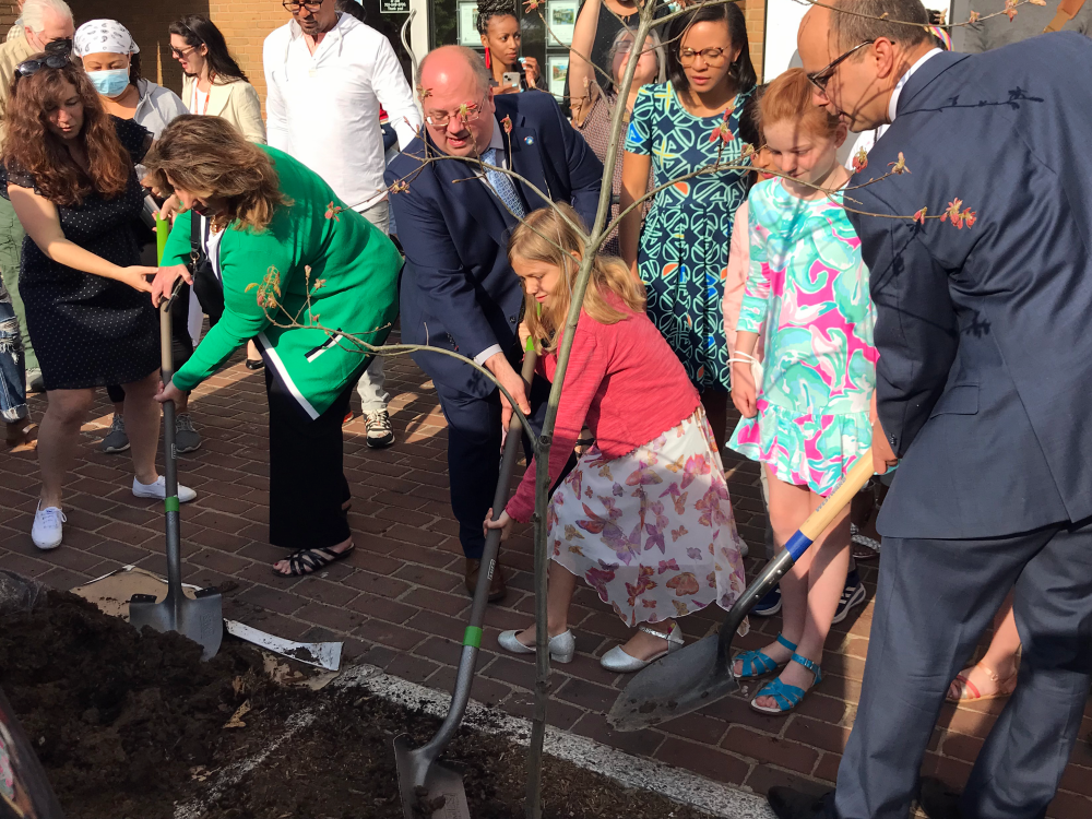The mayor, vice mayor, members of council, and residents plant trees at the 2022 Earth Day tree planting event. 