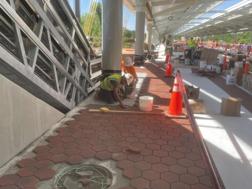 Installation of tile – East Platform