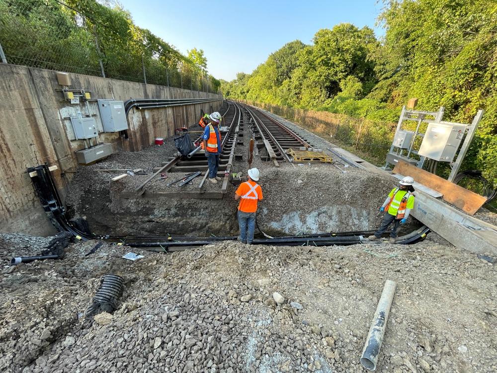 installation of conduit under tracks