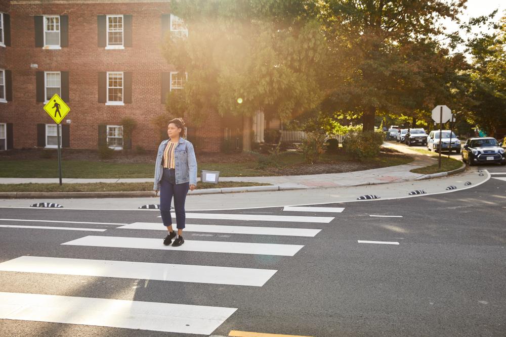 A person crossing the street