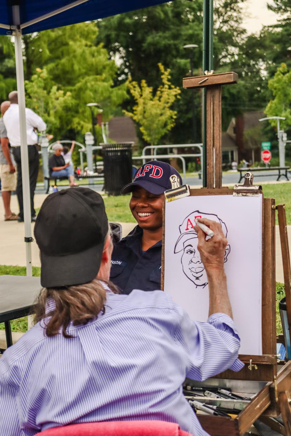Alexandria police is posing for a caricature sketch