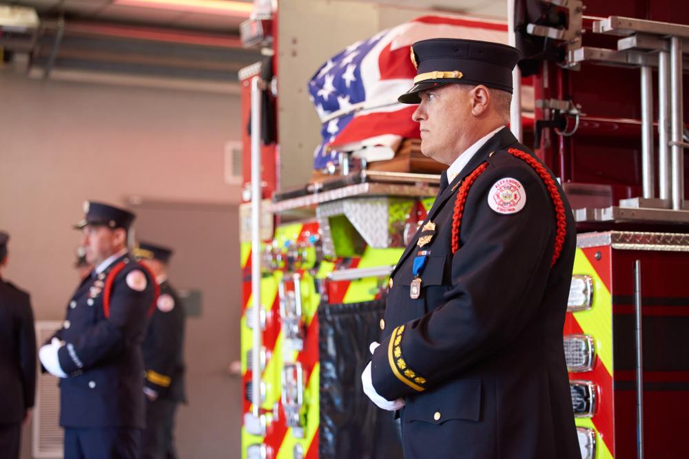 Members of a multi-jurisdictional public safety honor guard remain on watch prior to the funeral procession for Deputy Chief Brian Hricik on Saturday, March 11, 2023.
