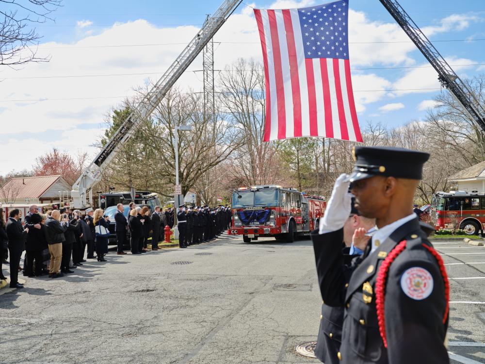 The funeral procession for Medical Services Deputy Chief Brian Hricik arrives at Vienna Presbyterian Church on Saturday, March 11, 2023.