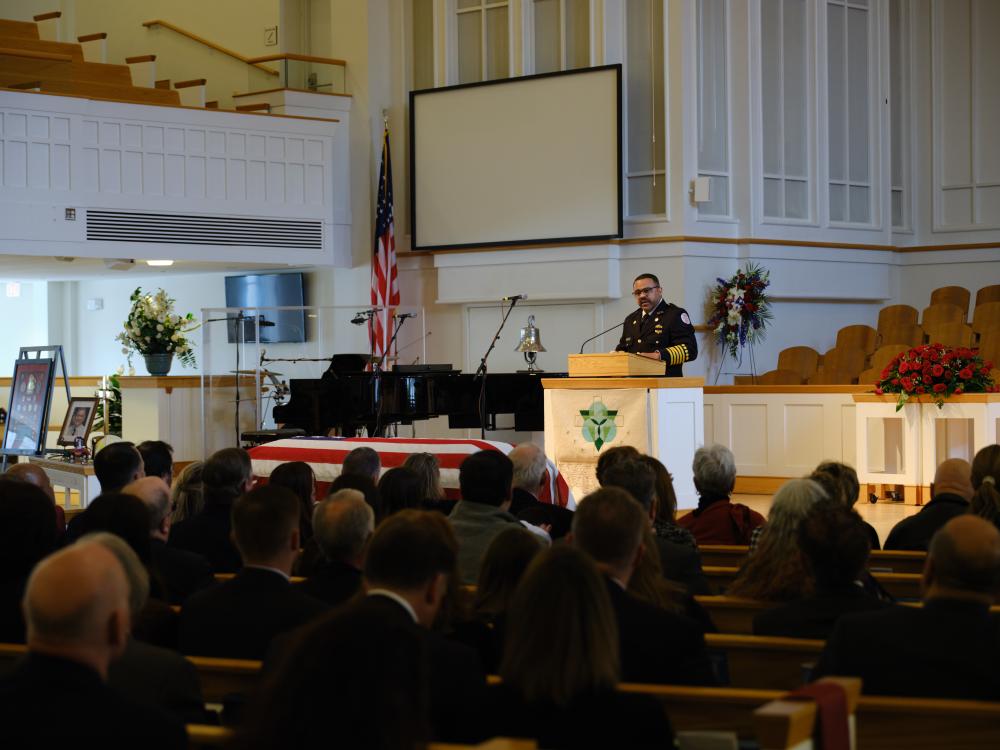 Fire/EMS Chief Corey Smedley provides remarks during the memorial service for Deputy Chief Brian Hricik on Saturday, March 11, 2023.