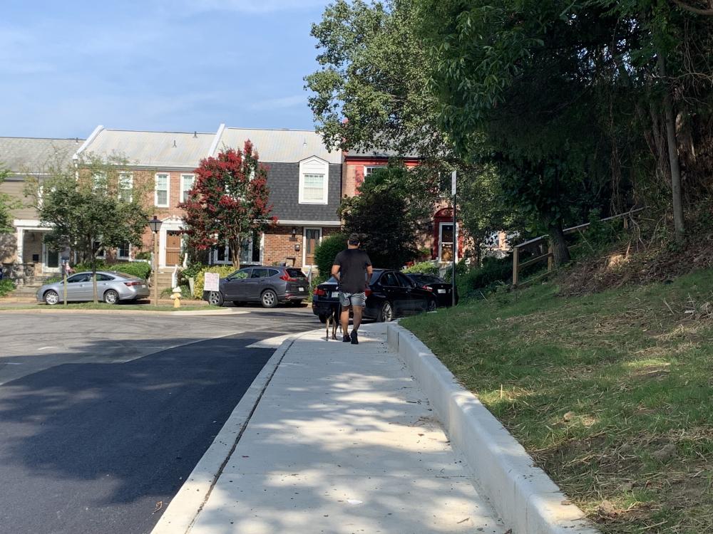 A photo of a new sidewalk on Polk Avenue