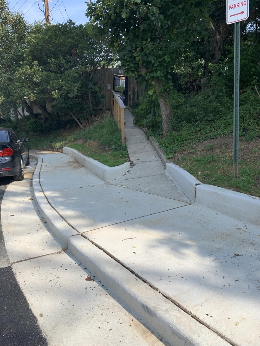 A photo of a new sidewalk on Polk Avenue