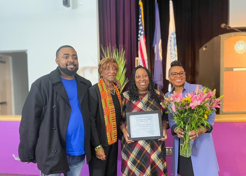 nechelle, her family, and rose smile