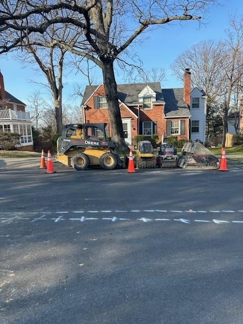 Photo of excavation equipment staged for construction.