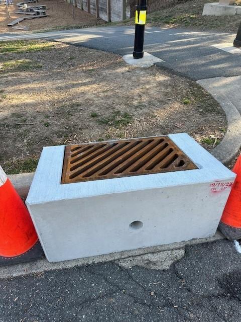 Photo of pre-cast storm drain grate prior to construction.