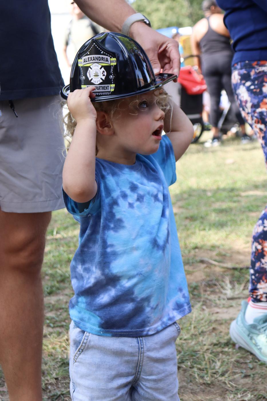 Little boy with a firefighter hat