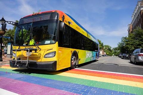 pride bus and rainbow crosswalk