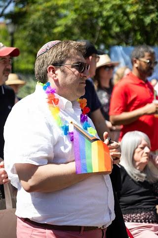 Person holding a pride flag