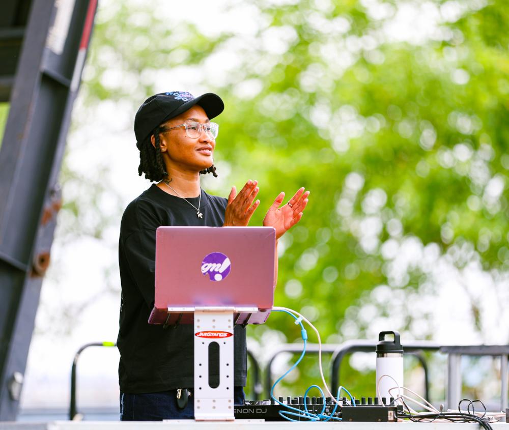 The DJ clapping
