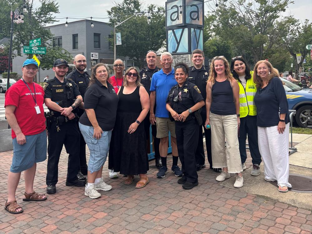 Sheriff, deputies and community members enjoing National Night Out