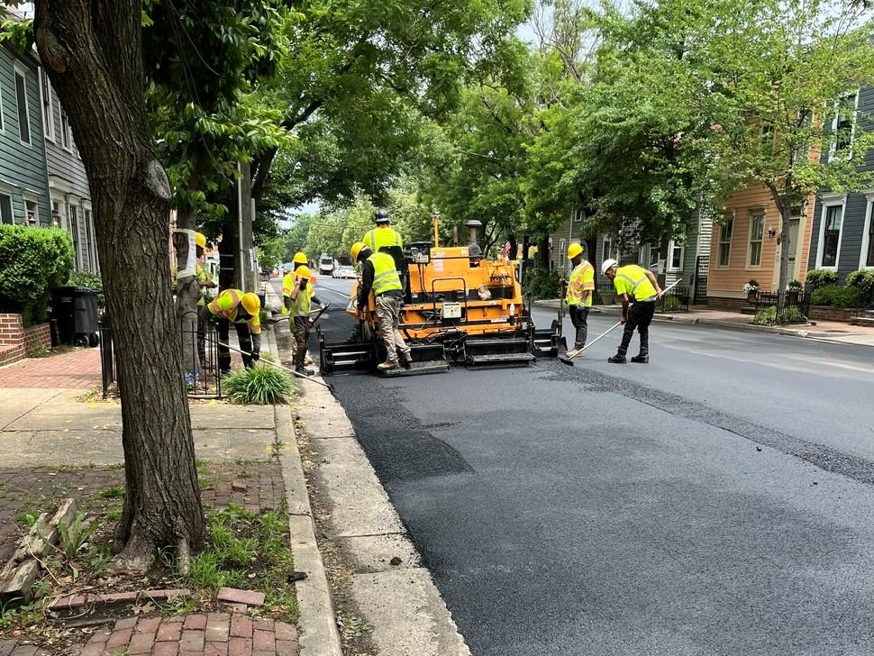 After the pipes and manholes are installed underground, the project finishes with road repairs, including new asphalt and striping as seen on the 300 block of N Alfred St.