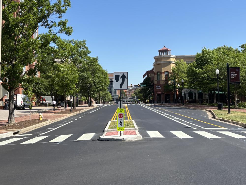 A photo of new pedestrian and bicycle safety treatments on Holland Lane.