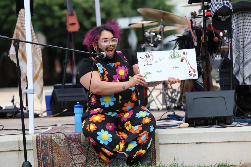 Speaker on stage at Alexandria Pride 2026